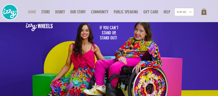 Screenshot of Izzy Wheels homepage with a colourful hero image of a two women